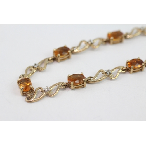 36 - 9ct gold diamond and citrine station bracelet (4.9g)
