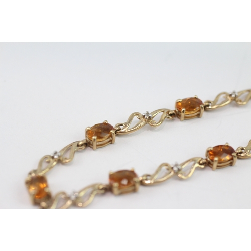 36 - 9ct gold diamond and citrine station bracelet (4.9g)
