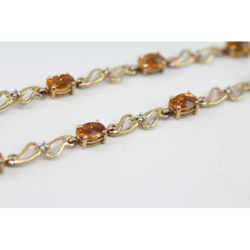 36 - 9ct gold diamond and citrine station bracelet (4.9g)