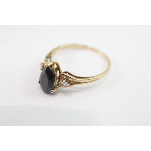 42 - 9ct gold pear cut sapphire & diamond dress ring (2g) Size P