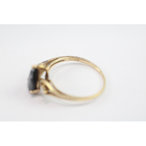 42 - 9ct gold pear cut sapphire & diamond dress ring (2g) Size P