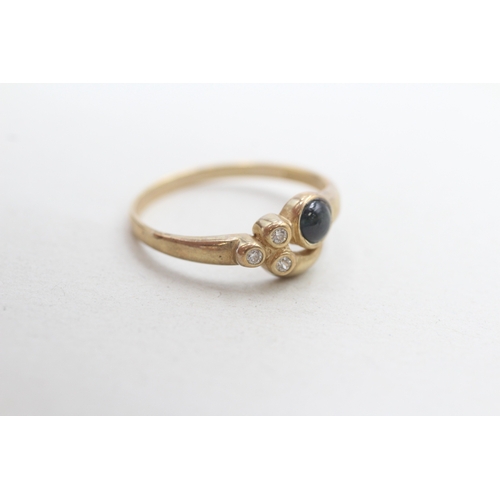 27 - 9ct gold sapphire cabochon and white gemstone dress ring (1.8g) Size O 1/2