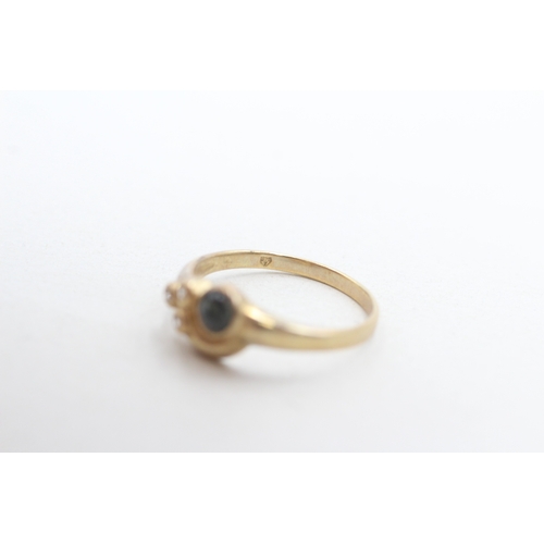 27 - 9ct gold sapphire cabochon and white gemstone dress ring (1.8g) Size O 1/2