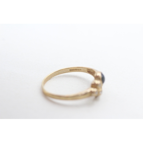 27 - 9ct gold sapphire cabochon and white gemstone dress ring (1.8g) Size O 1/2