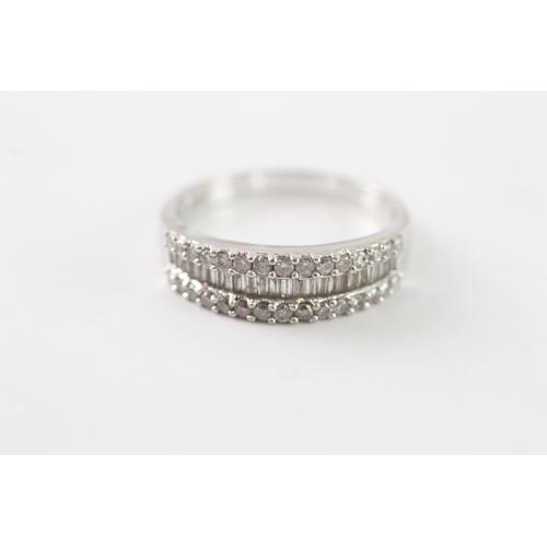 28 - 9ct white gold baguette and round cut diamond ring (4g) Size R 1/2