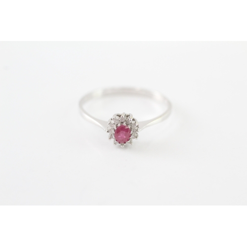 42 - 9ct gold ruby and diamond halo ring (1.5g) Size Q