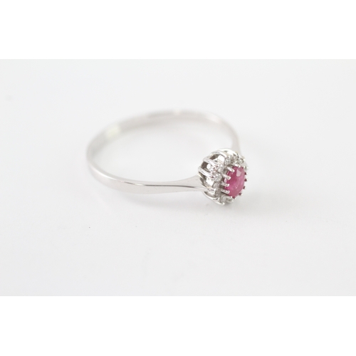 42 - 9ct gold ruby and diamond halo ring (1.5g) Size Q