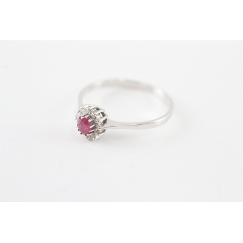 42 - 9ct gold ruby and diamond halo ring (1.5g) Size Q