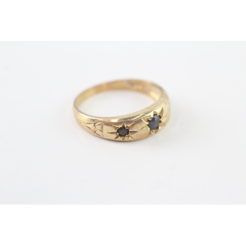 43 - 9ct gold sapphire three stone ring (2.8g) Size P