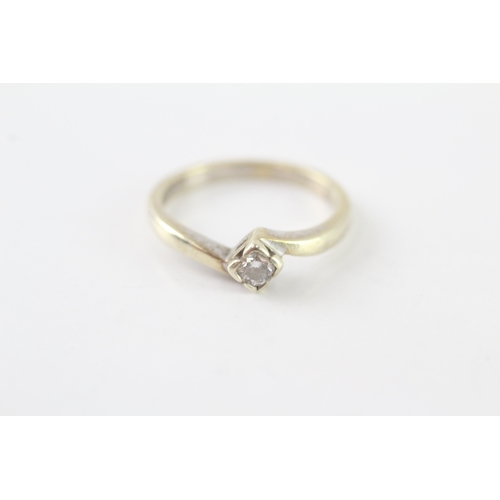 54 - 9ct gold diamond solitaire ring (2.6g) Size M