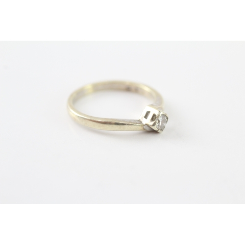 54 - 9ct gold diamond solitaire ring (2.6g) Size M