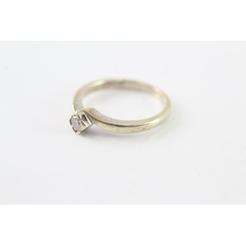 54 - 9ct gold diamond solitaire ring (2.6g) Size M