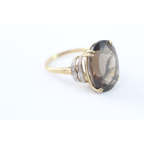 10 - 9ct gold diamond and smokey quartz cocktail ring (5.4g) Size P