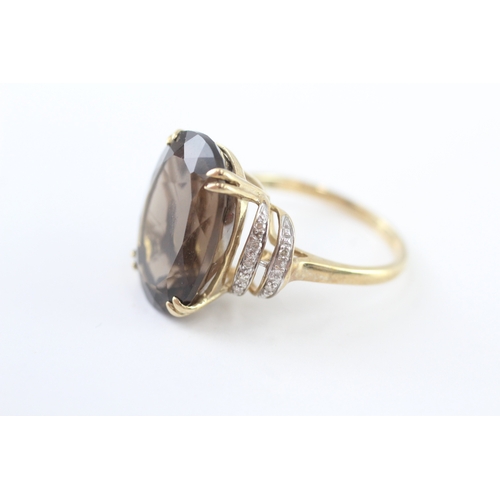 10 - 9ct gold diamond and smokey quartz cocktail ring (5.4g) Size P