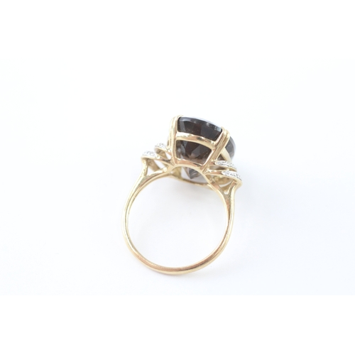 10 - 9ct gold diamond and smokey quartz cocktail ring (5.4g) Size P