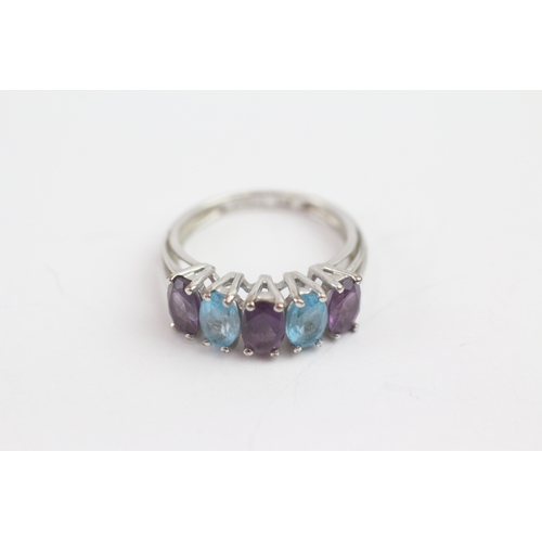 19 - 9ct white gold blue topaz and amethyst ring (3g) Size K 1/2