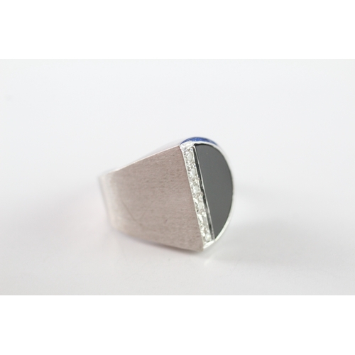 28 - 14ct white gold onyx and diamond abstract ring (5.3g) Size H