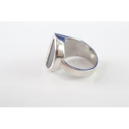 28 - 14ct white gold onyx and diamond abstract ring (5.3g) Size H