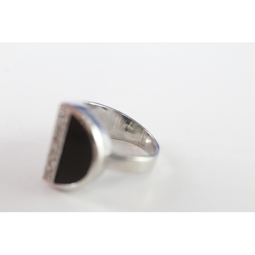 28 - 14ct white gold onyx and diamond abstract ring (5.3g) Size H