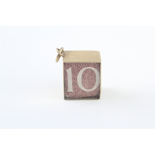 31 - 9ct gold emergency money charm (2.4g)