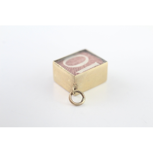 31 - 9ct gold emergency money charm (2.4g)