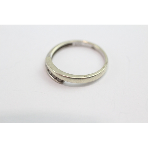 37 - 9ct white gold diamond set bypass ring (1.8g) Size N 1/2
