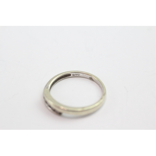 37 - 9ct white gold diamond set bypass ring (1.8g) Size N 1/2