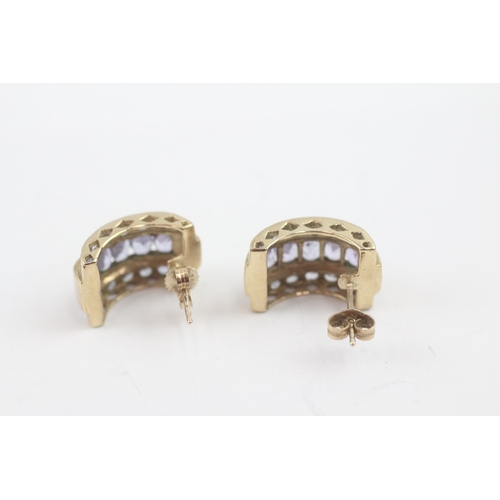 10 - 9ct gold tanzanite c-hoop earrings (4.7g)