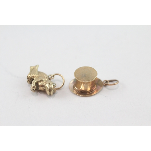 34 - 2x 9ct gold frog with diamond eyes and hat charms (2.4g)