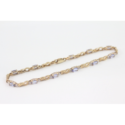 4 - 9ct gold tanzanite link bracelet (4.6g)