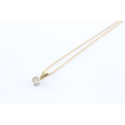 42 - 9ct gold diamond single stone pendant on chain (1.4g)
