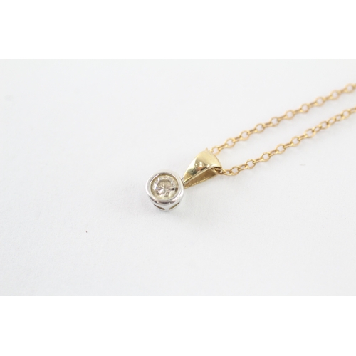 42 - 9ct gold diamond single stone pendant on chain (1.4g)
