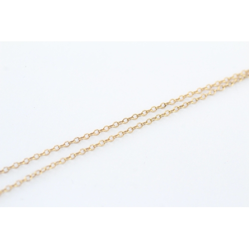 42 - 9ct gold diamond single stone pendant on chain (1.4g)