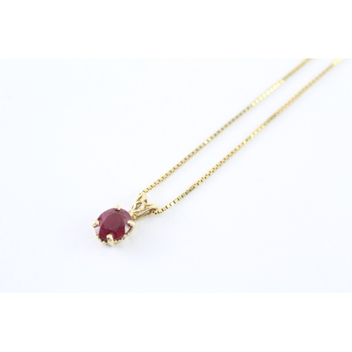 43 - 14ct gold ruby single pendant on chain (3g)