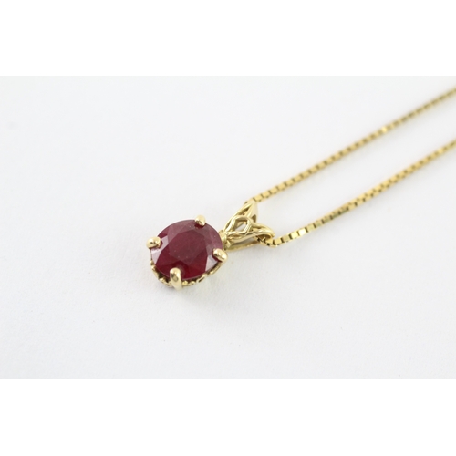 43 - 14ct gold ruby single pendant on chain (3g)
