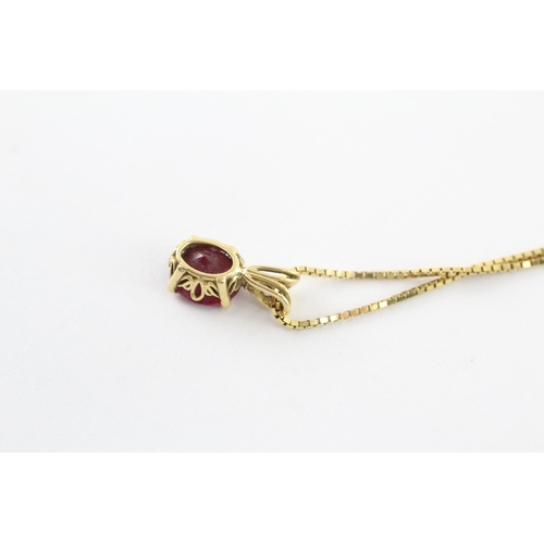 43 - 14ct gold ruby single pendant on chain (3g)