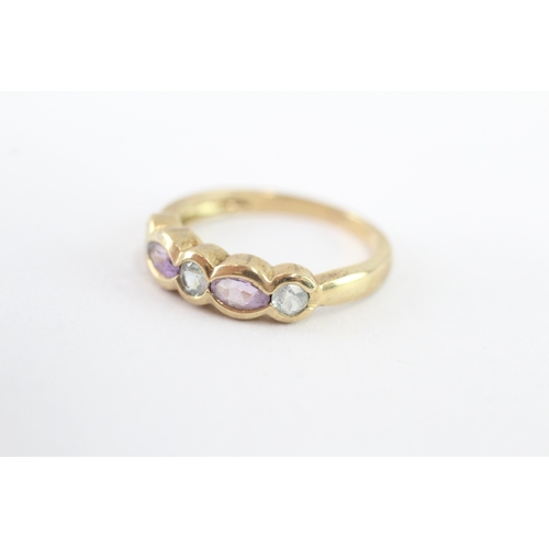 46 - 9ct gold marquise cut amethyst and blue topaz ring (2.5g) Size O