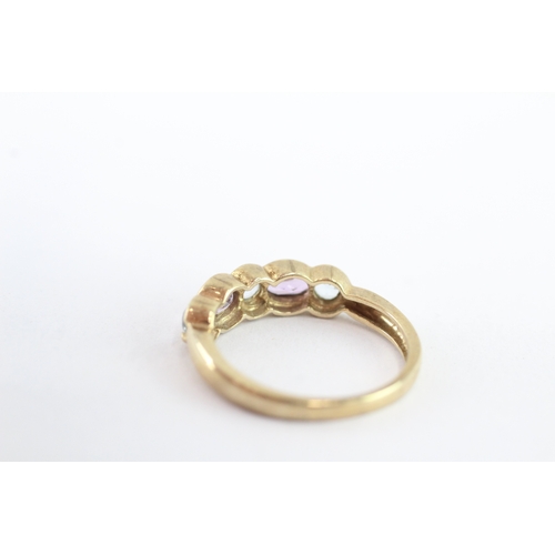 46 - 9ct gold marquise cut amethyst and blue topaz ring (2.5g) Size O