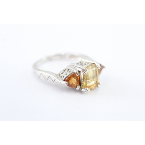 48 - 9ct white gold citrine trilogy ring (5.1g) Size N