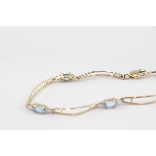 50 - 9ct gold blue topaz link bracelet (3.1g)