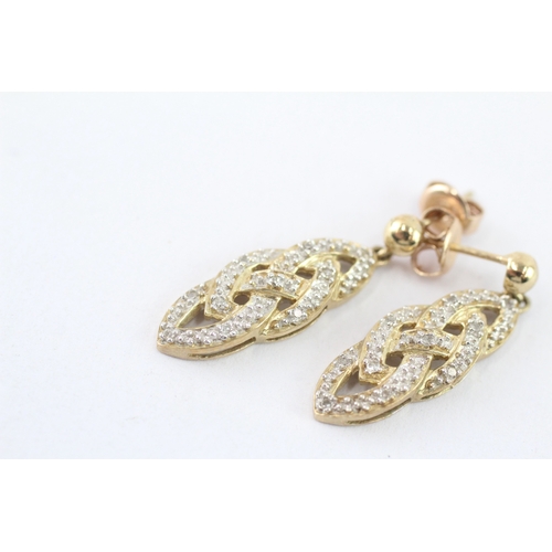 56 - 9ct gold diamond drop earrings (4g)