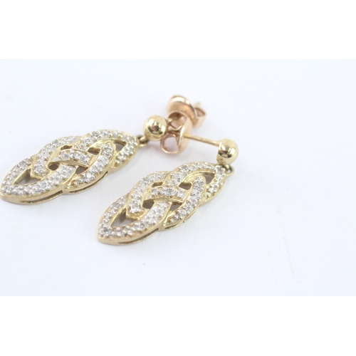 56 - 9ct gold diamond drop earrings (4g)