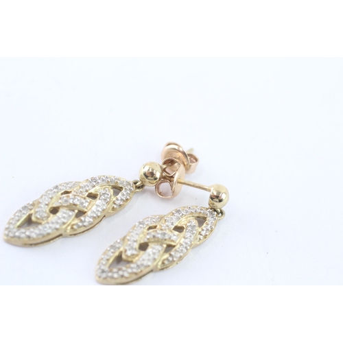 56 - 9ct gold diamond drop earrings (4g)