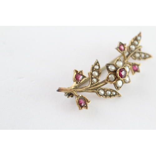 6 - 9ct gold ruby and seed pearl floral brooch (3.2g)