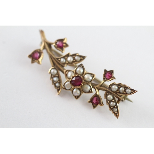 6 - 9ct gold ruby and seed pearl floral brooch (3.2g)