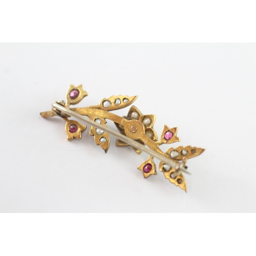 6 - 9ct gold ruby and seed pearl floral brooch (3.2g)