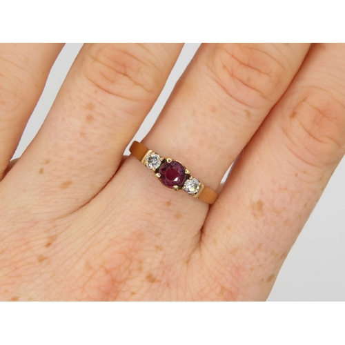 44 - 9ct gold ruby & diamond trilogy ring (1.8g) Size P 1/2