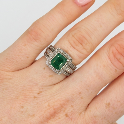 5 - 9ct white gold diamond and emerald ring AF: stone chipped with surface reaching fractures (4g) Size ... 