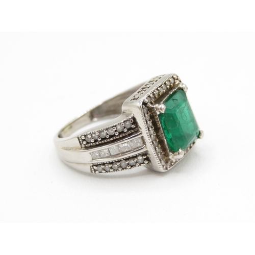 5 - 9ct white gold diamond and emerald ring AF: stone chipped with surface reaching fractures (4g) Size ... 