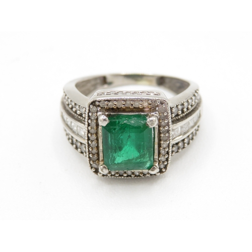 5 - 9ct white gold diamond and emerald ring AF: stone chipped with surface reaching fractures (4g) Size ... 